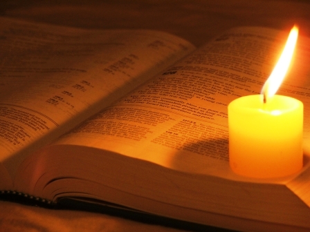 candle on bible